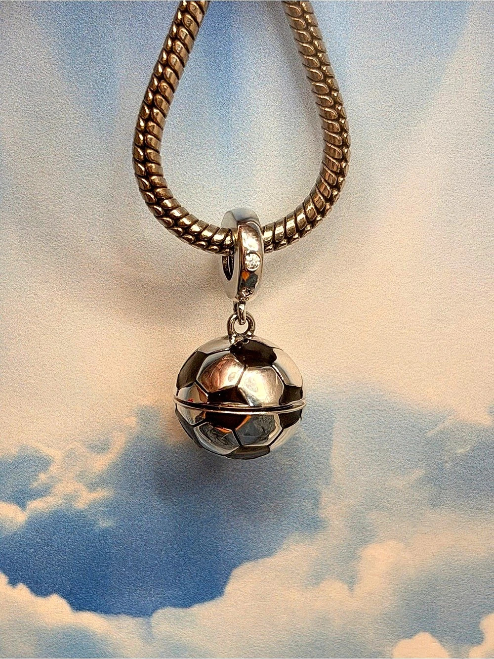 Openable sterling silver soccer ball with cleat charm pendant
